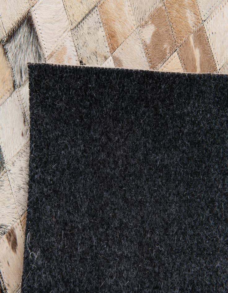 Detail image of 5' 1 x 8' Cowhide Stocks Rug