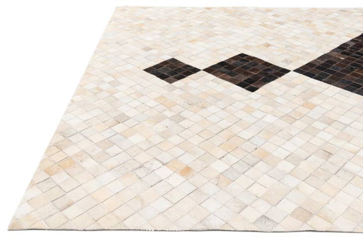Detail image of 5' x 7' 11 Cowhide Stocks Rug