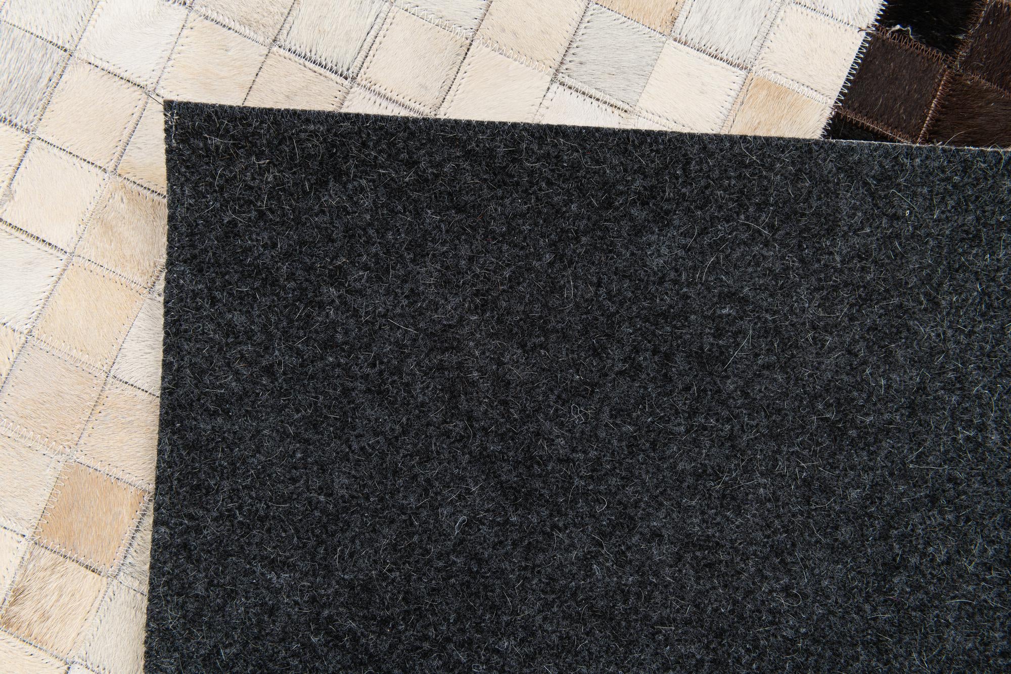 5' x 7' 11 Cowhide Stocks Rug