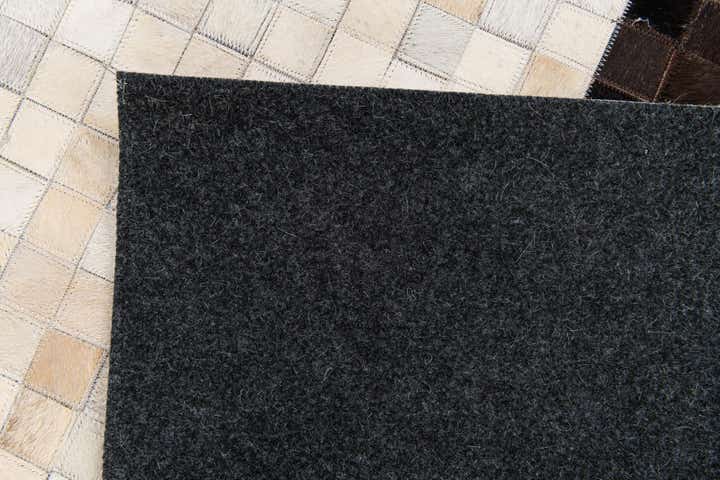 5' x 7' 11 Cowhide Stocks Rug