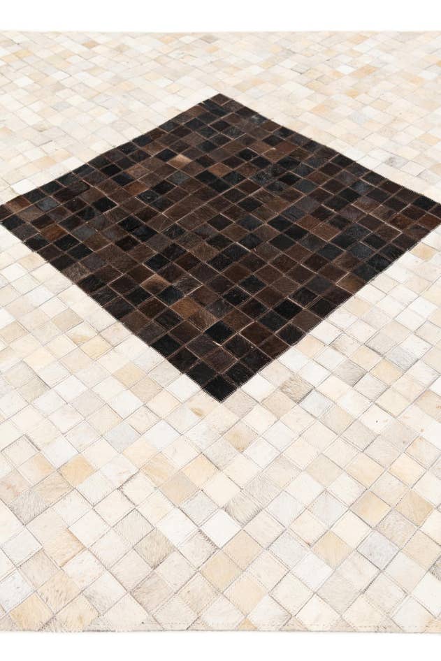Detail image of 5' x 7' 11 Cowhide Stocks Rug