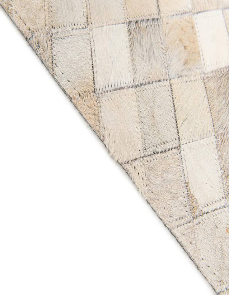Detail image of 5' x 7' 11 Cowhide Stocks Rug
