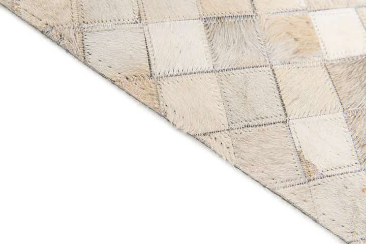 5' x 7' 11 Cowhide Stocks Rug