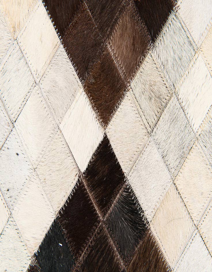 Detail image of 5' x 7' 11 Cowhide Stocks Rug