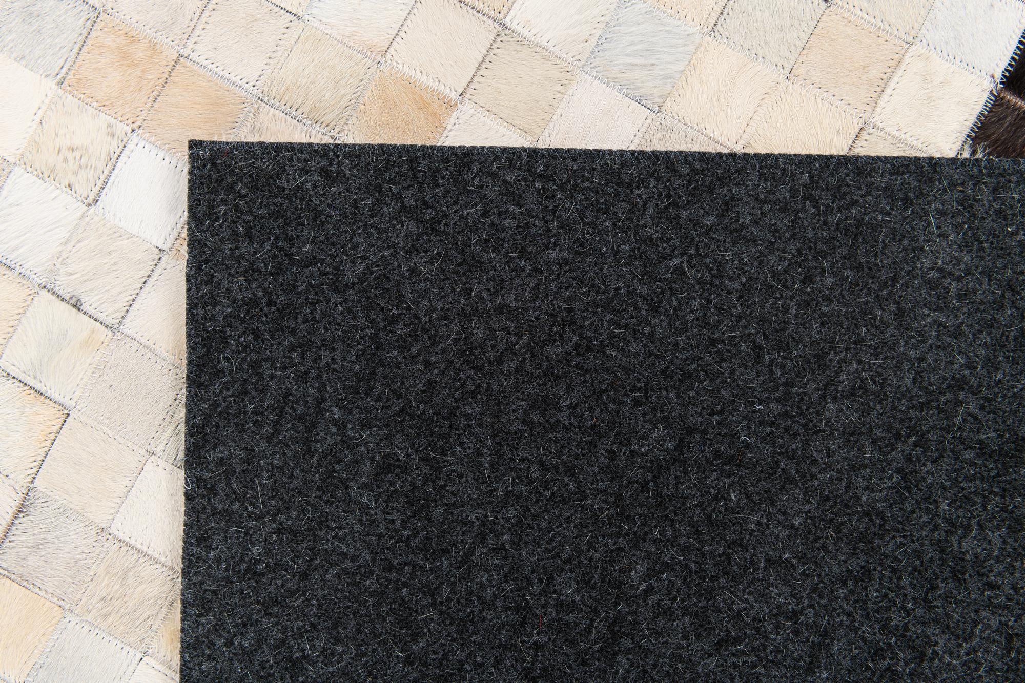 5' x 7' 11 Cowhide Stocks Rug