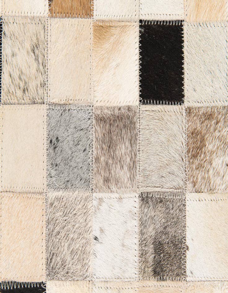 Detail image of 5' x 7' 11 Cowhide Stocks Rug