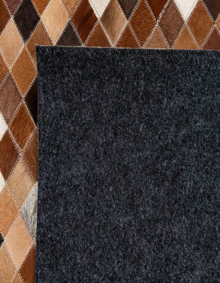 Detail image of 5' 9 x 8' 1 Cowhide Stocks Rug