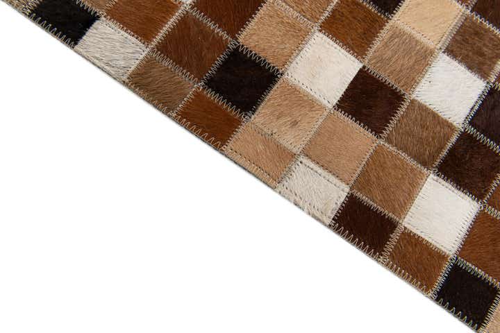 5' 9 x 8' 1 Cowhide Stocks Rug