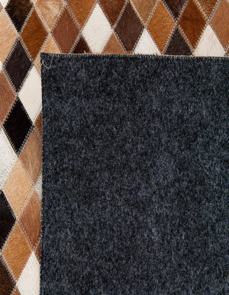 Detail image of 5' 9 x 8' 1 Cowhide Stocks Rug