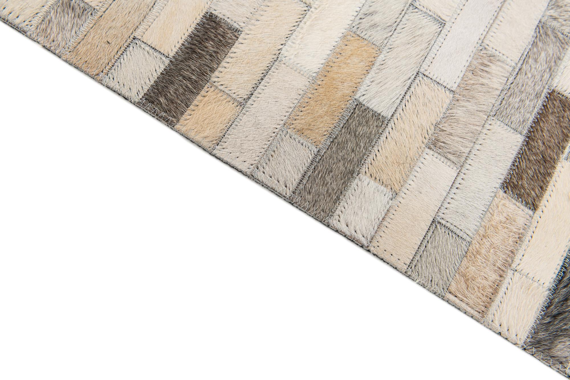 5' 8 x 7' 10 Cowhide Stocks Rug