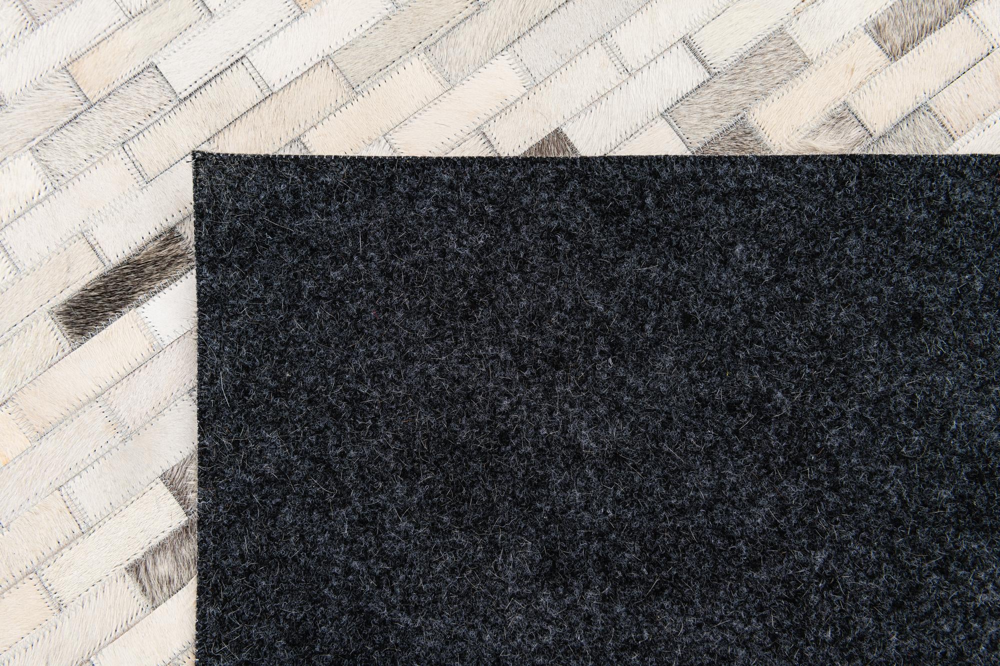5' 8 x 7' 10 Cowhide Stocks Rug