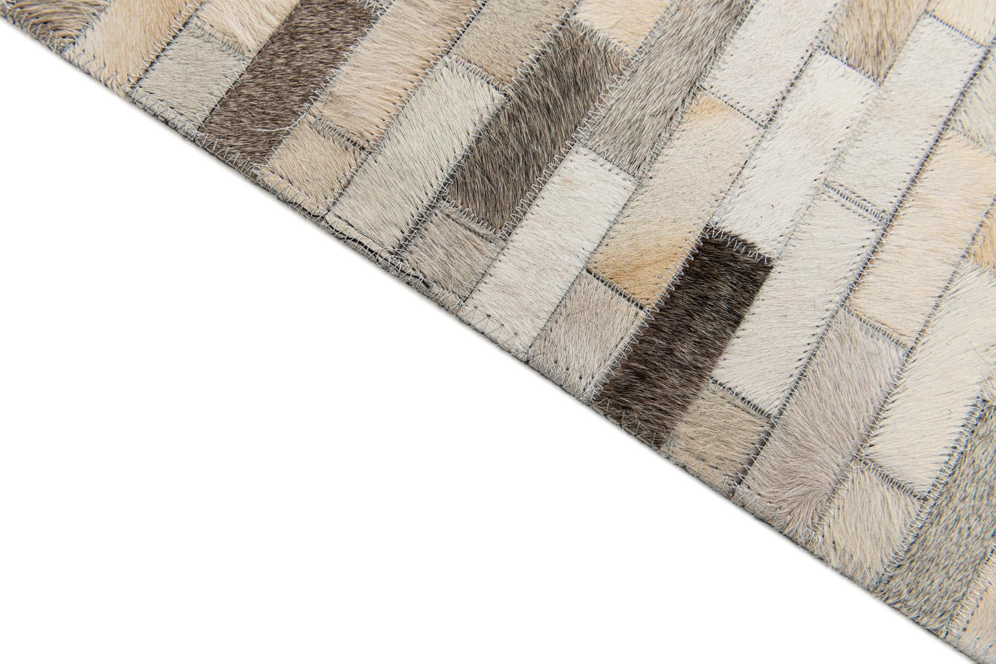 5' 9 x 7' 11 Cowhide Stocks Rug