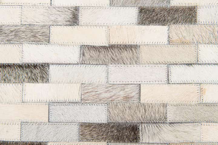 5' 9 x 7' 11 Cowhide Stocks Rug