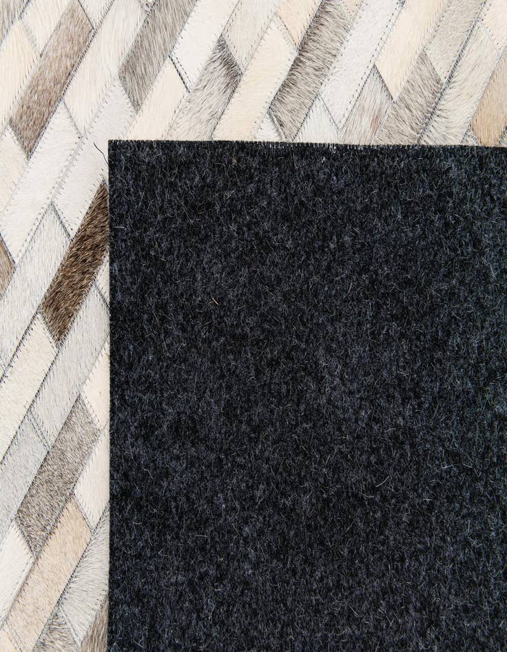 Detail image of 5' 9 x 7' 11 Cowhide Stocks Rug