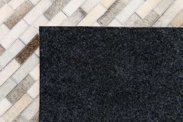 5' 9 x 7' 11 Cowhide Stocks Rug