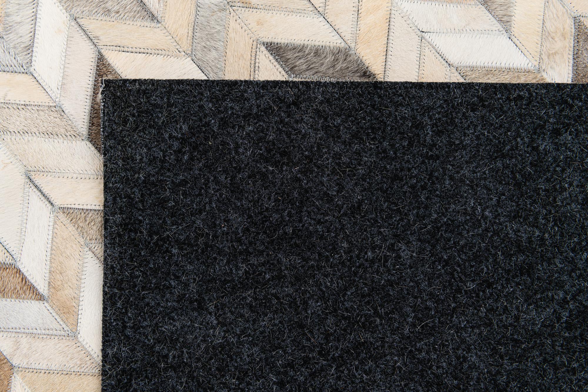 5' 9 x 7' 11 Cowhide Stocks Rug