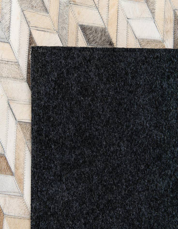 Detail image of 5' 9 x 7' 11 Cowhide Stocks Rug