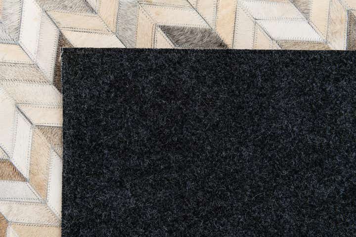 5' 9 x 7' 11 Cowhide Stocks Rug