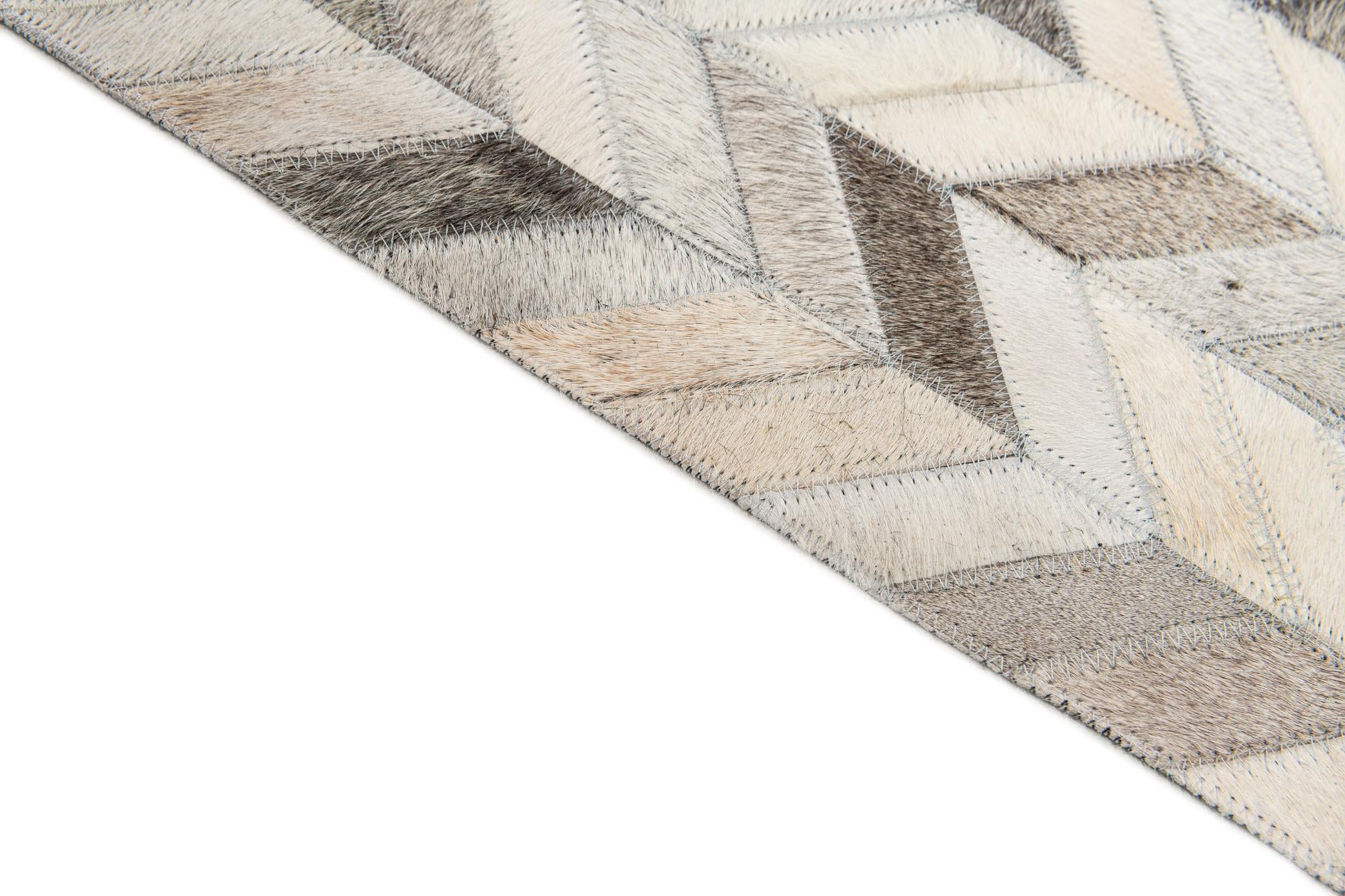5' 9 x 8' 1 Cowhide Stocks Rug