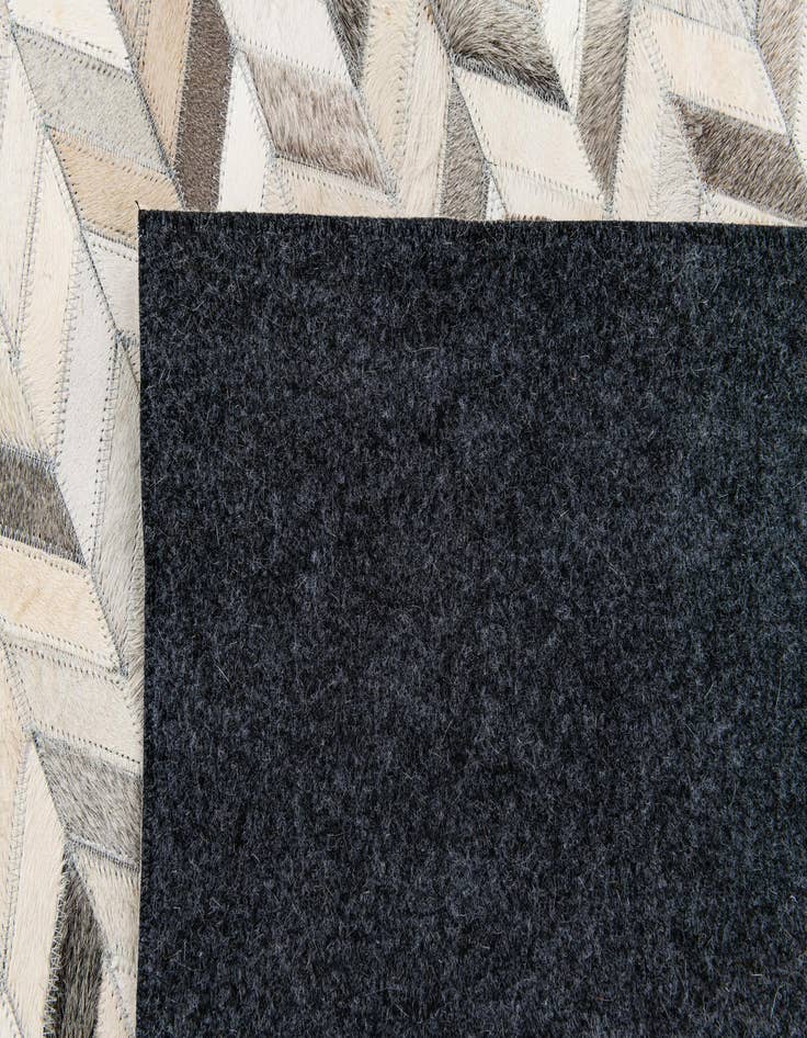 Detail image of 5' 9 x 8' 1 Cowhide Stocks Rug