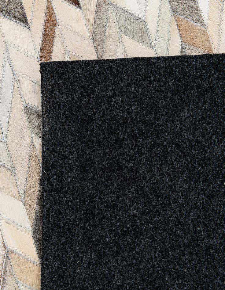 Detail image of 5' 7 x 7' 11 Cowhide Stocks Rug