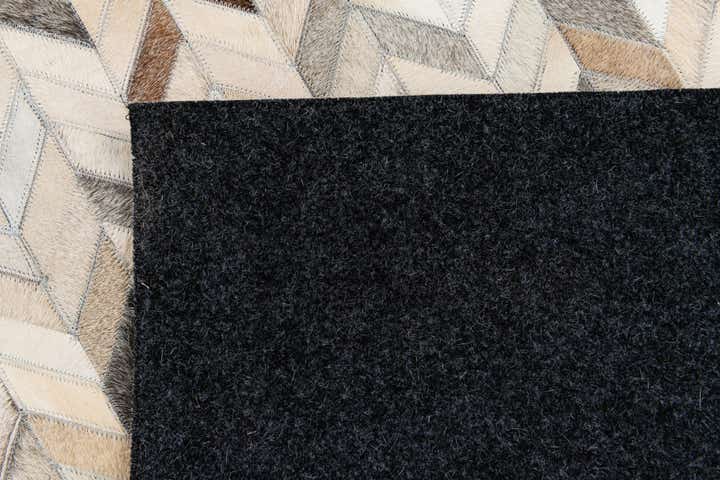 5' 7 x 7' 11 Cowhide Stocks Rug