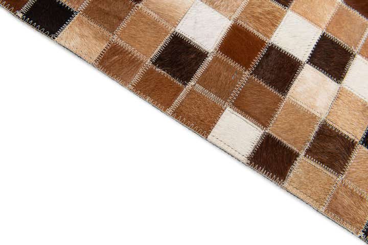 5' 9 x 8' Cowhide Stocks Rug