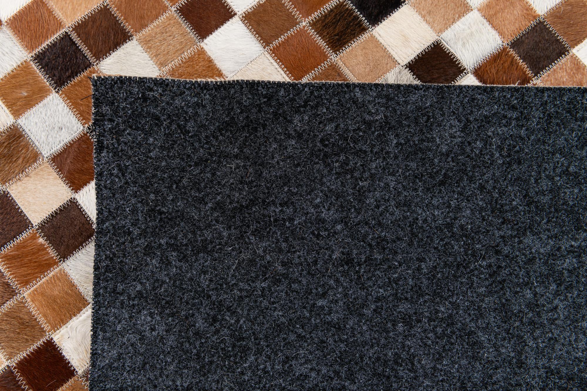 5' 9 x 7' 11 Cowhide Stocks Rug