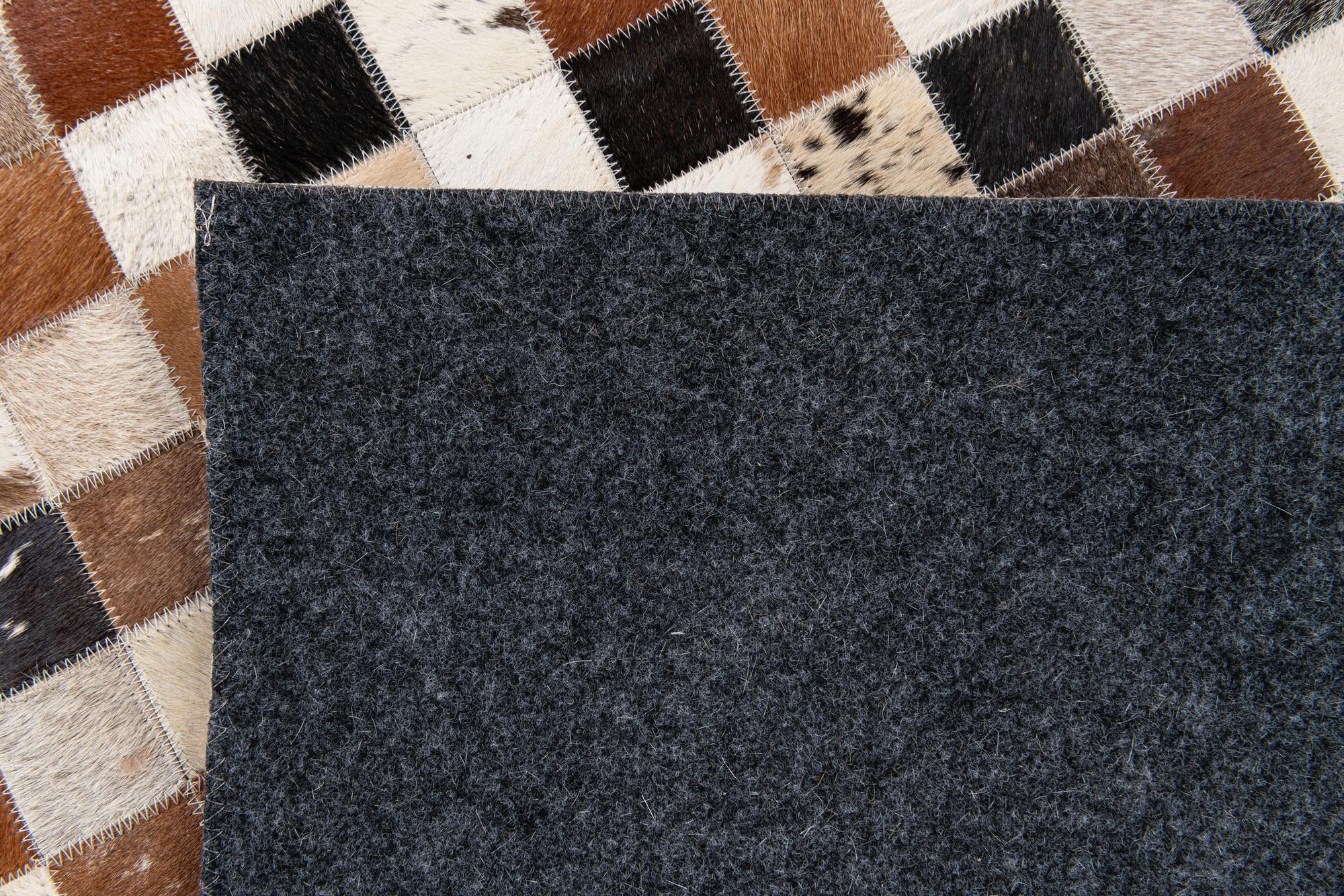 5' 1 x 7' 9 Cowhide Stocks Rug