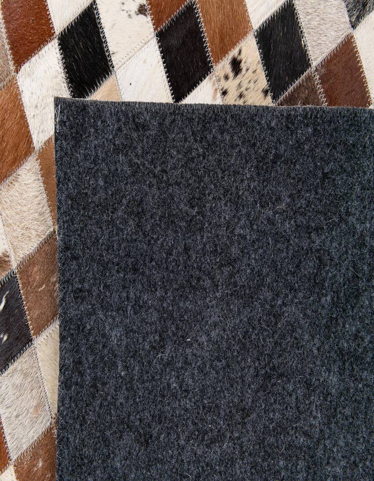 Detail image of 5' 1 x 7' 9 Cowhide Stocks Rug