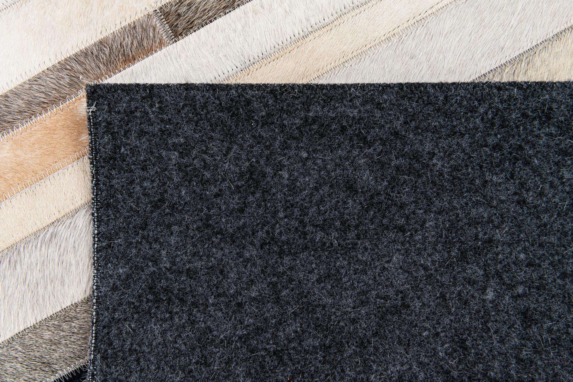 5' x 8' Cowhide Stocks Rug