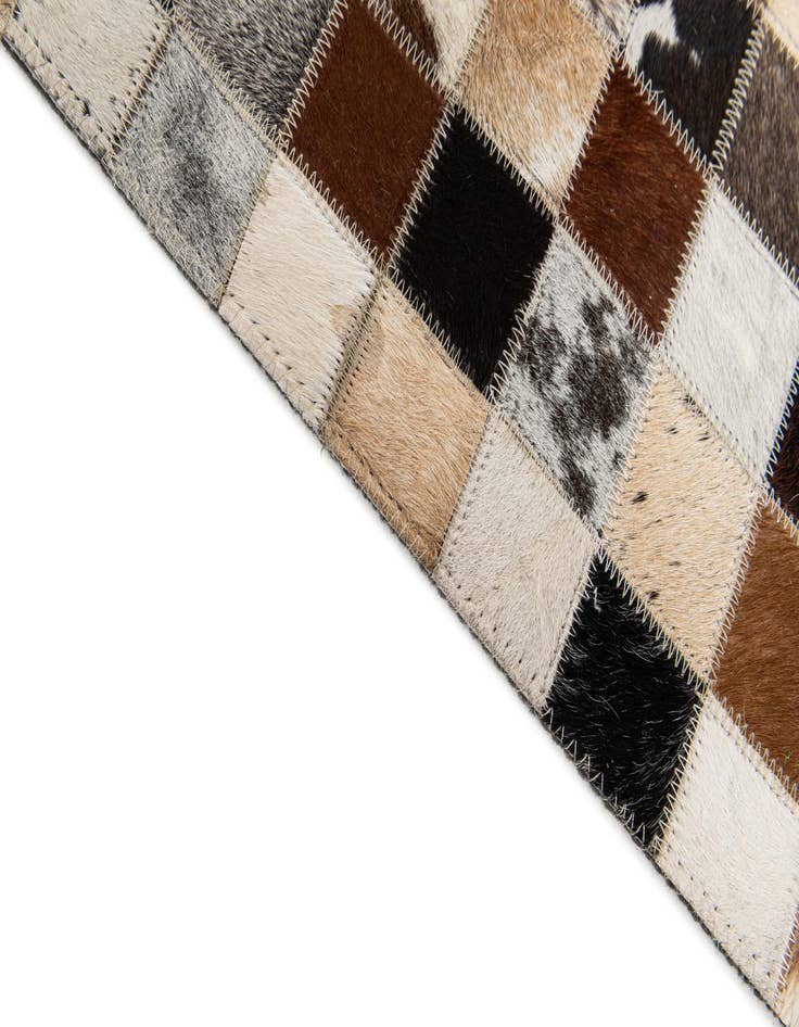 Detail image of 5' x 7' 11 Cowhide Stocks Rug