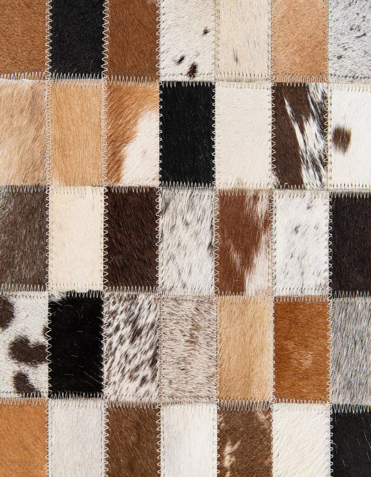 Detail image of 5' x 7' 11 Cowhide Stocks Rug