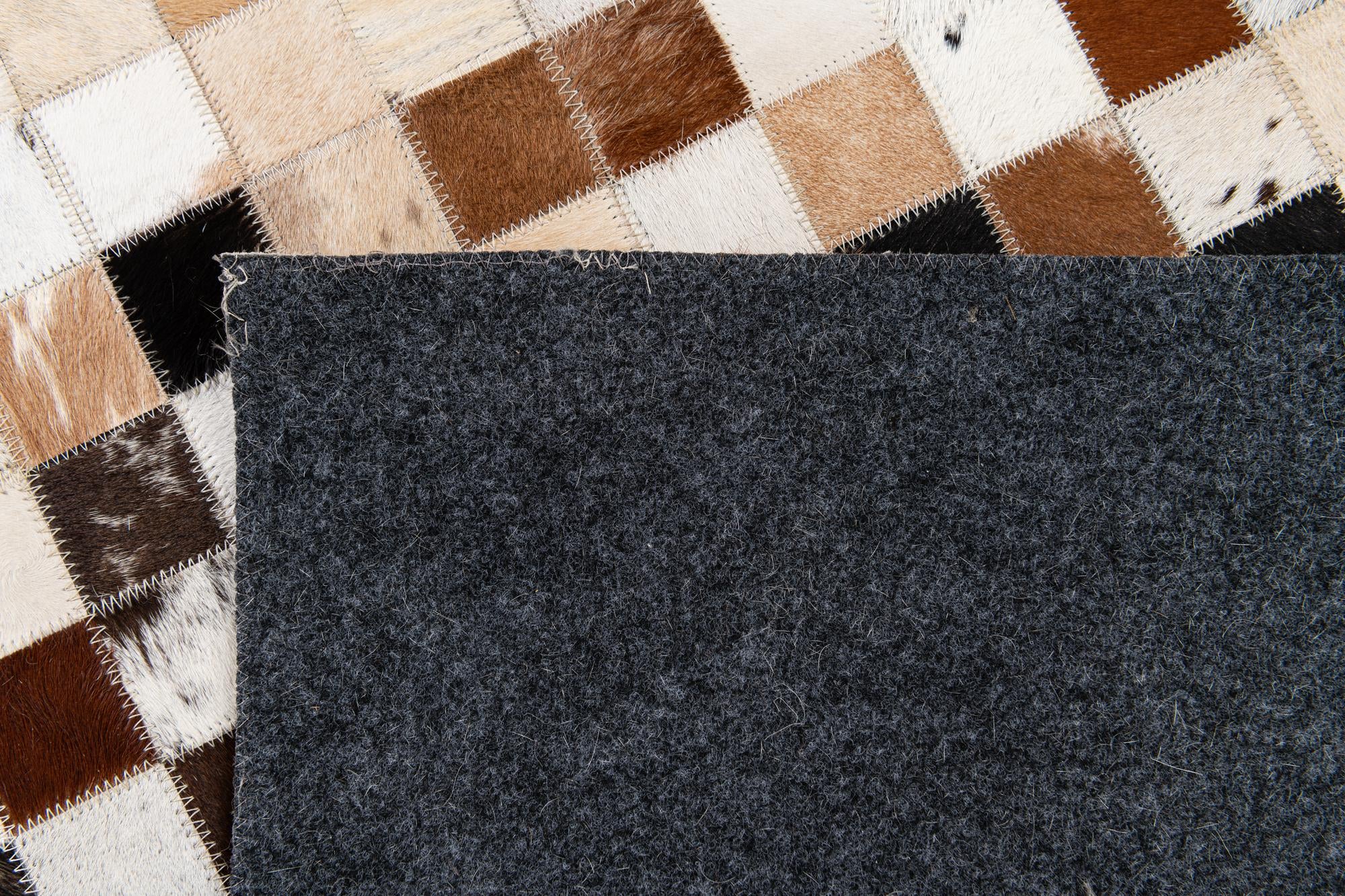 5' x 7' 11 Cowhide Stocks Rug