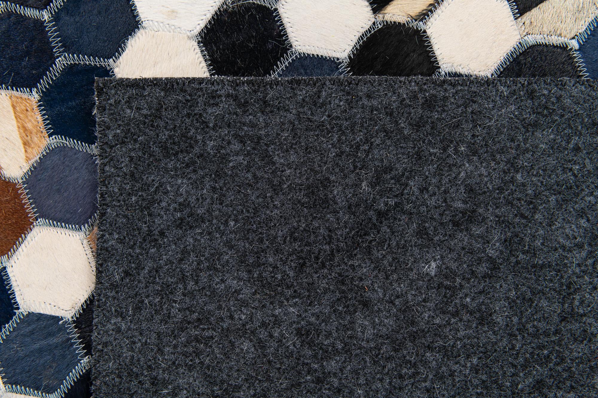5' 1 x 8' Cowhide Stocks Rug