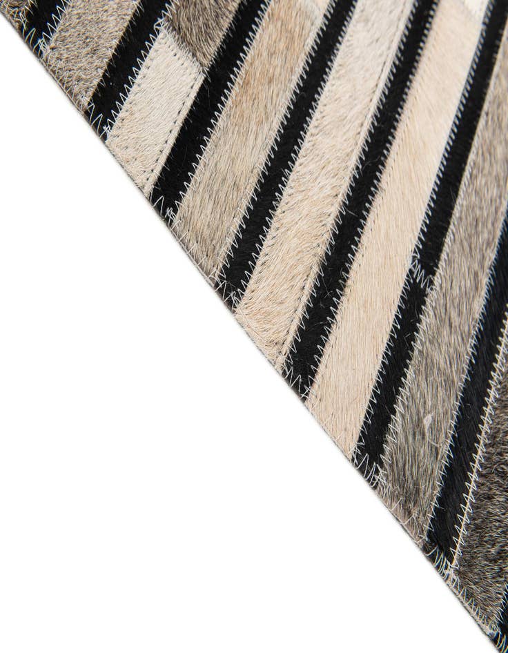 Detail image of 5' 1 x 8' Cowhide Stocks Rug