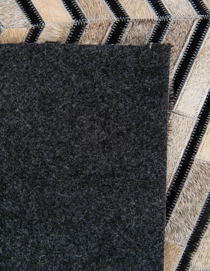 Detail image of 5' 1 x 8' Cowhide Stocks Rug