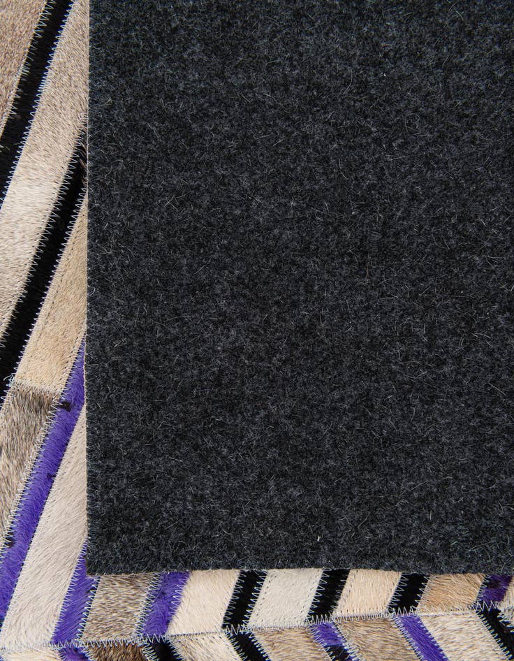 Detail image of 5' x 7' 10 Cowhide Stocks Rug