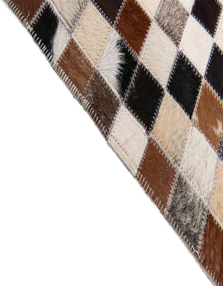 Detail image of 5' x 7' 9 Cowhide Stocks Rug