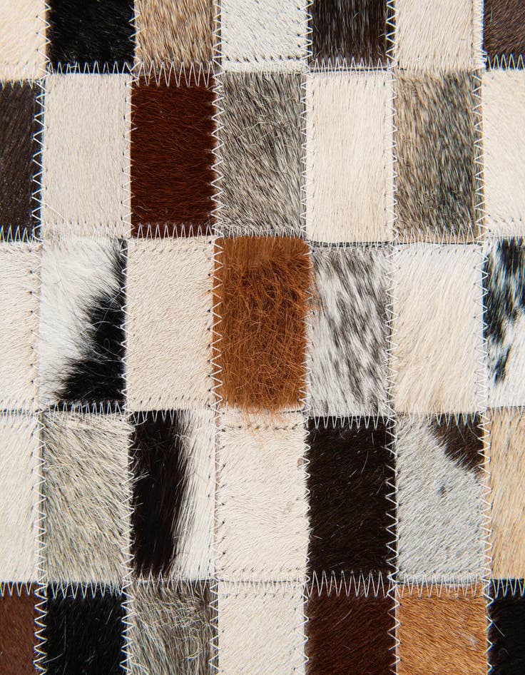 Detail image of 5' x 7' 9 Cowhide Stocks Rug