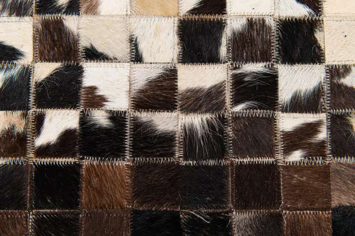 5' x 7' 10 Cowhide Stocks Rug
