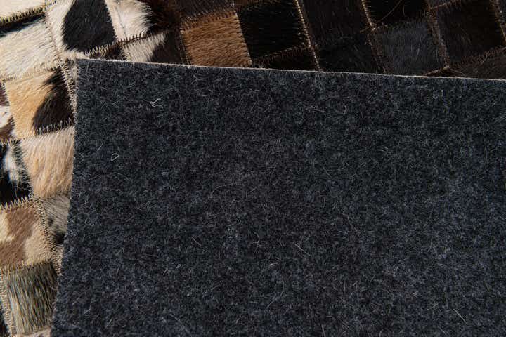 5' x 7' 10 Cowhide Stocks Rug