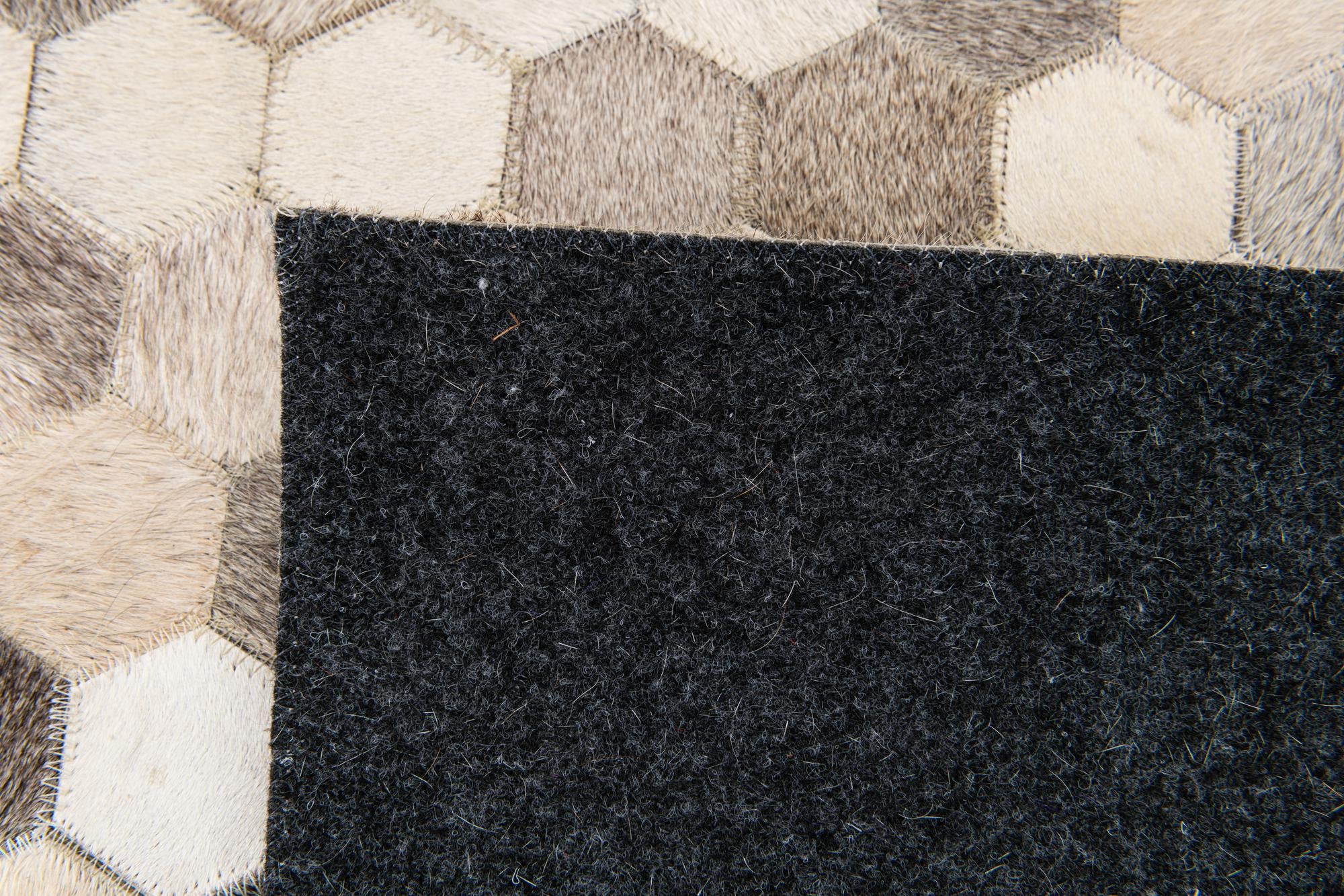 5' 1 x 8' Cowhide Stocks Rug