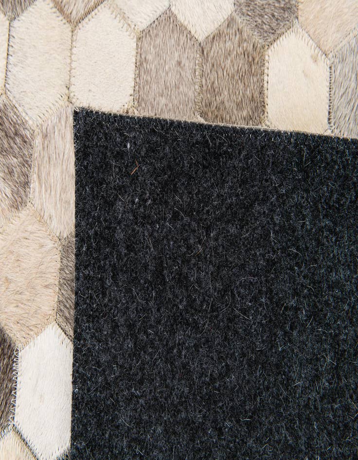 Detail image of 5' 1 x 8' Cowhide Stocks Rug