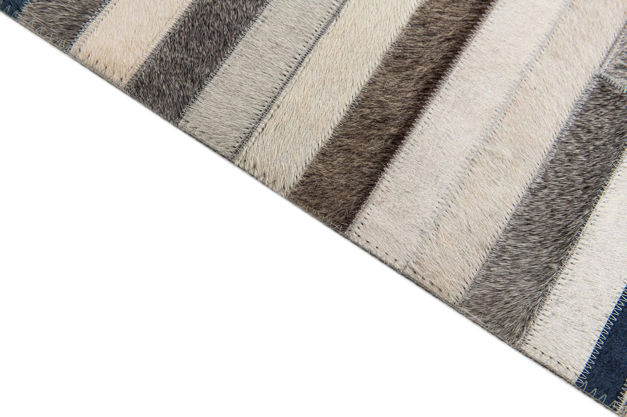 5' x 7' 10 Cowhide Stocks Rug