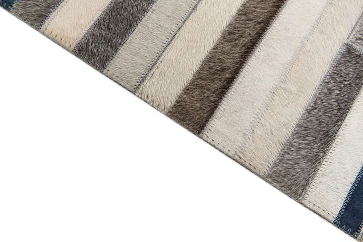 5' x 7' 10 Cowhide Stocks Rug