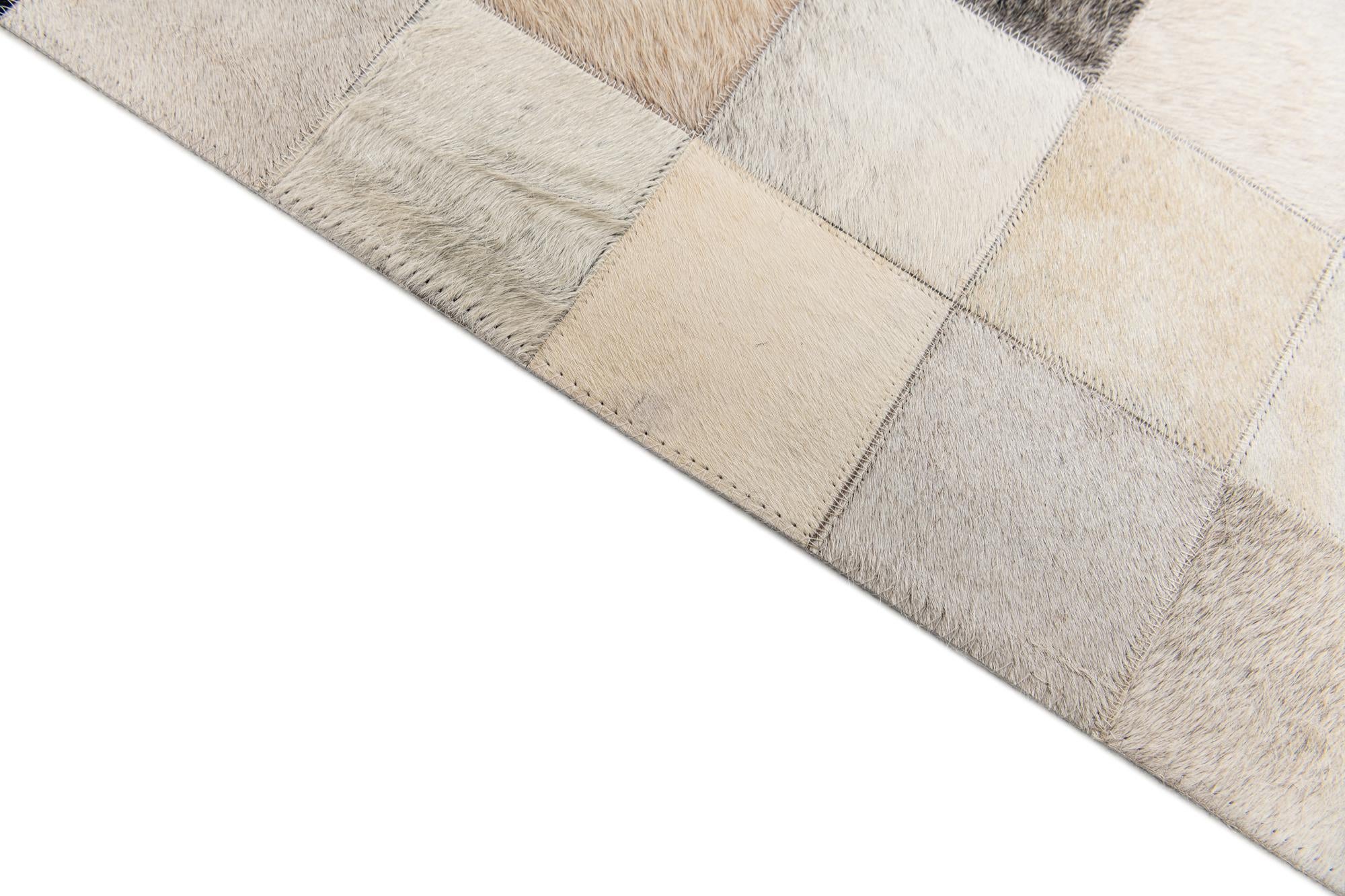 5' x 8' Cowhide Stocks Rug