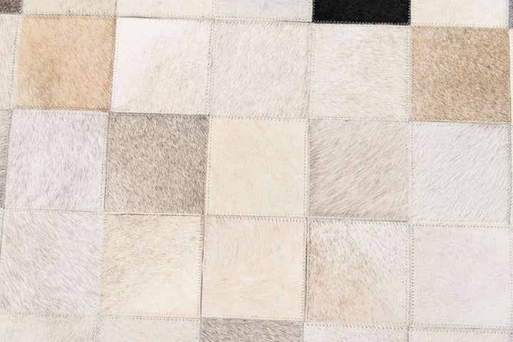 5' x 8' Cowhide Stocks Rug