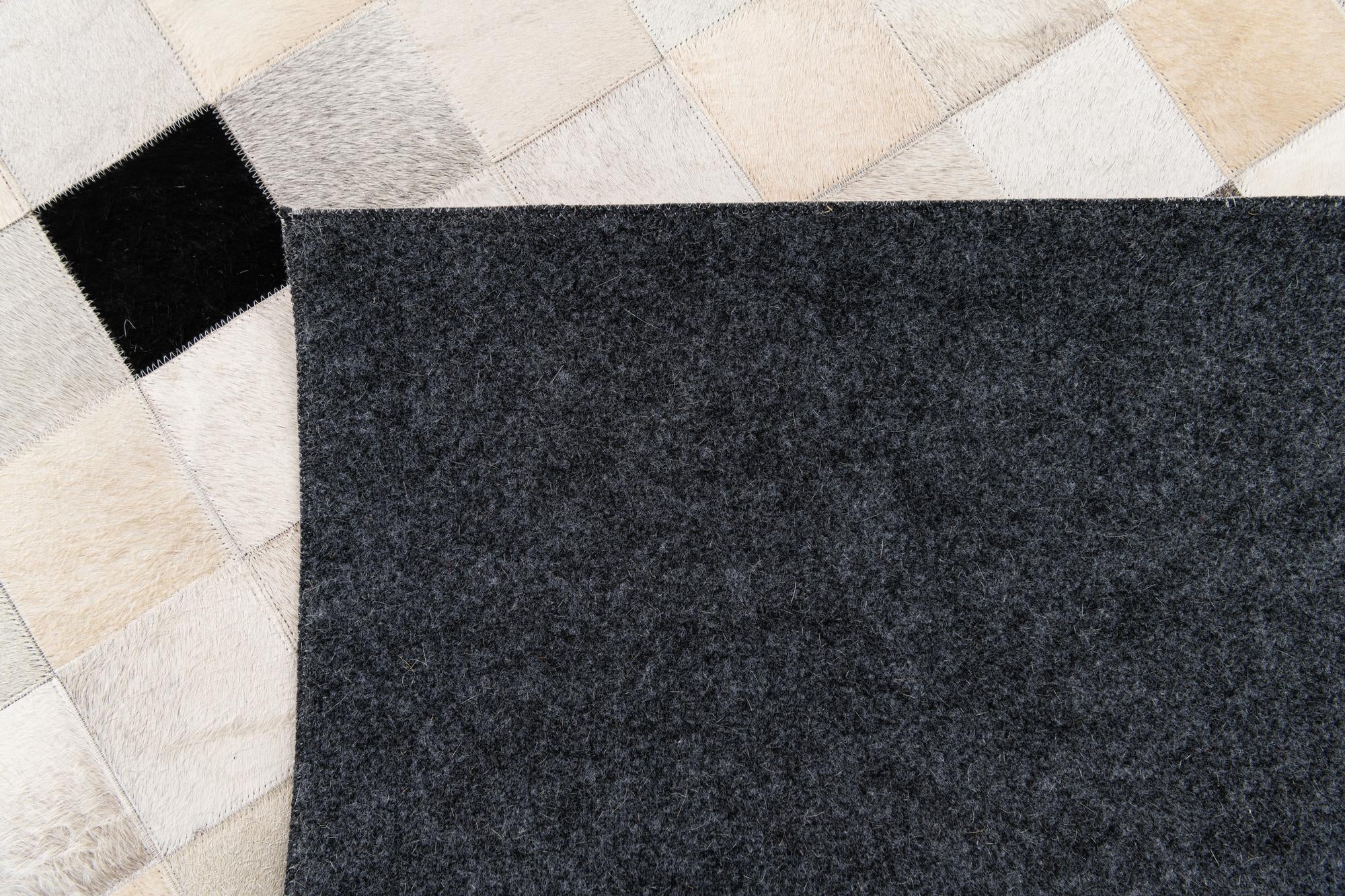 5' x 8' Cowhide Stocks Rug
