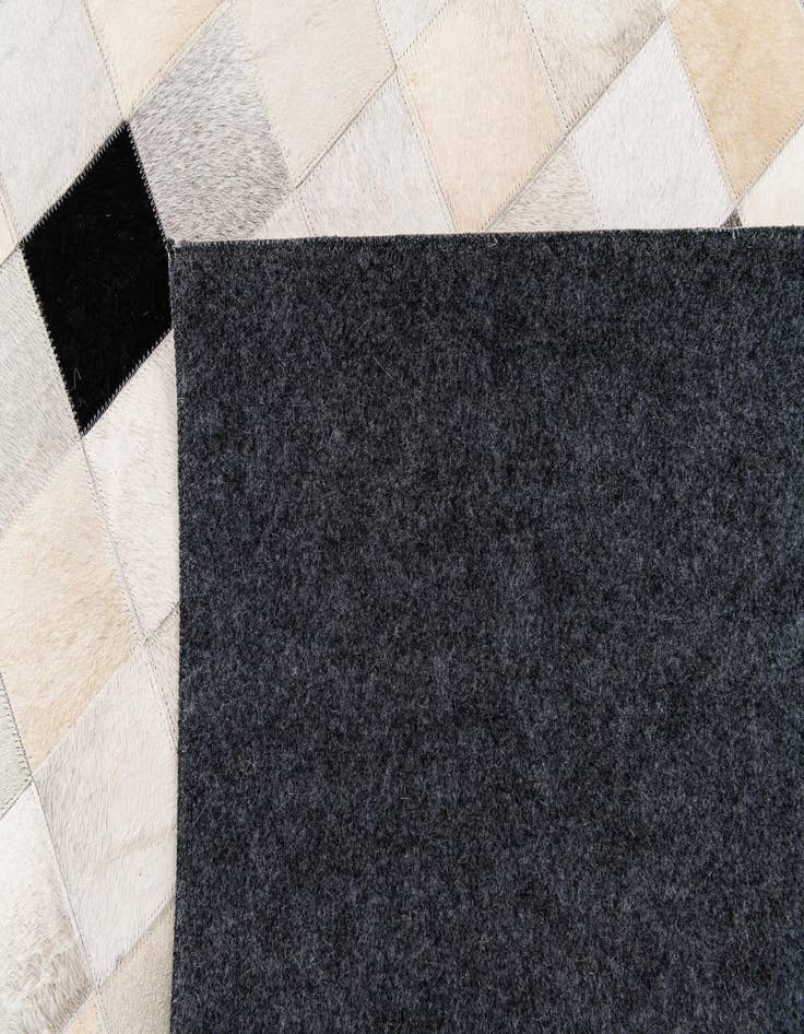 Detail image of 5' x 8' Cowhide Stocks Rug